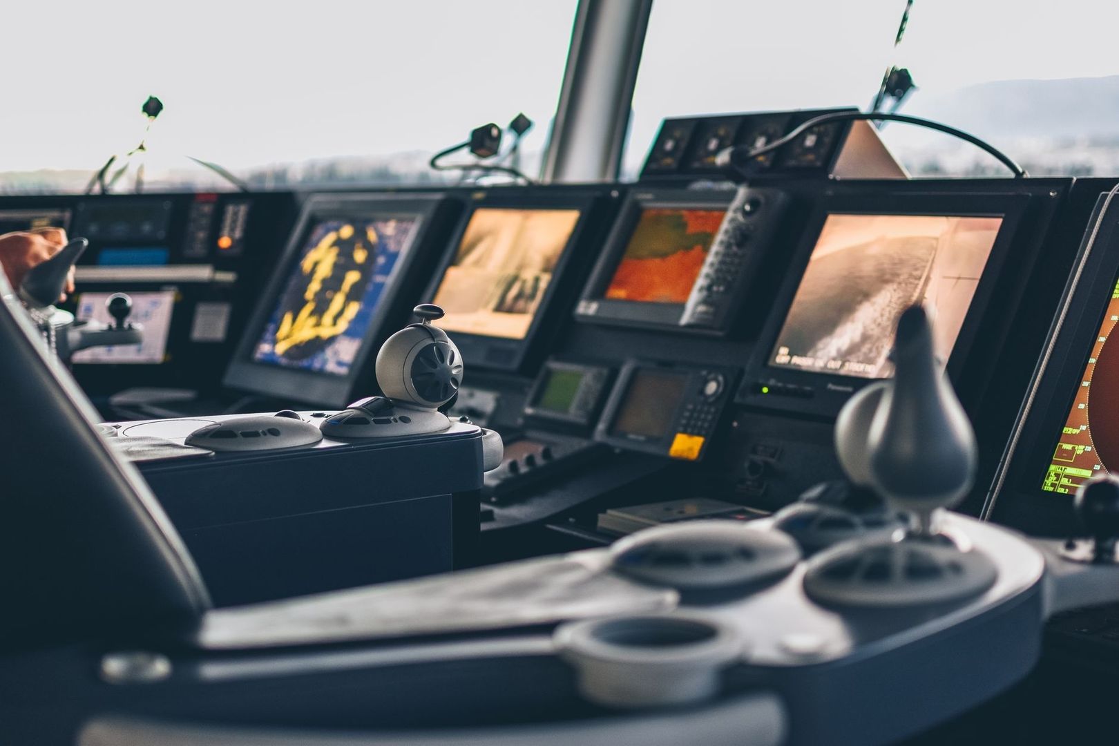 Marine navigation console with multiple sonar and chart displays